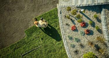 Aerial View of Gardener Installing Brand New Grass photo