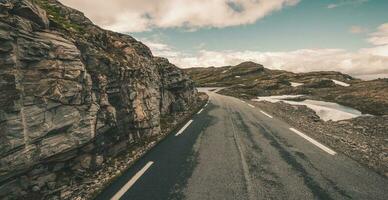 Road In Rocky Mountain Of Norway. photo