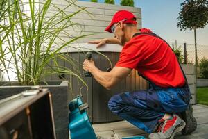 Hot Tubs Technician Finishing Garden SPA Installation photo