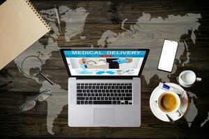 order online pharmacy by laptop photo