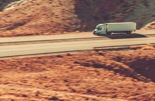 Speeding Semi Trailer Truck on Interstate 70 USA photo