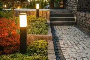 Backyard LED Light Posts Along the Garden Path photo