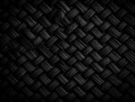 Dark black Abstract woven mat texture. Wickerwork background created with technology photo