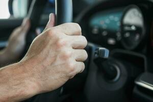 Hands On Steering Wheel Of Car. photo