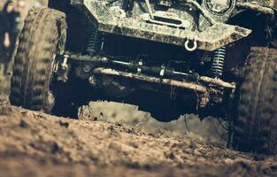 Off Road Automobile On Rough Muddy Ground. photo