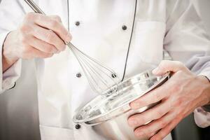 Chef Mixing Ingredients photo