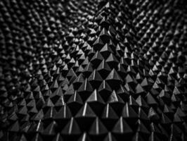 Futuristic abstract pyramid geometric dark black background created with technology photo