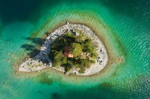 Aerial View of the Schonbichl Island at Eibsee Lake photo