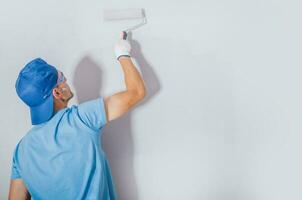 Men Painting His Apartment photo