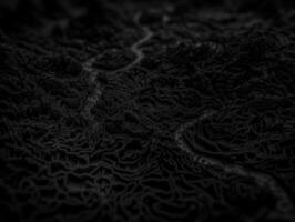 Black and white paper cut terrain background created with technology. photo