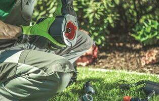 Garden Irrigation Technician with Garden Watering System Element photo