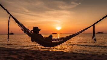 Young man is looking at the sunrise photo