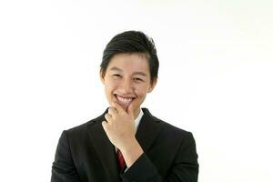 South East Asian young Chinese man wearing formal business office ware on white pose smile at camera photo