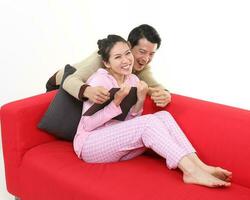 South East Asian young father mother daughter son parent girl child activity indoor photo