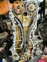 Car engine motor timing chain belt cover open for repair photo