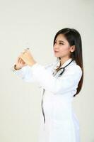 Young Asian female doctor wearing apron uniform tunic apron hold photo