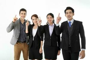 Southeast Asian middle eastern Caucasian young office business man woman wearing suit stand pint finger up idea thinking wonder confident happy success expression on white studio background photo