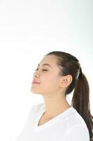 beautiful young south east Asian Chinese relax eye closed face up on white background photo