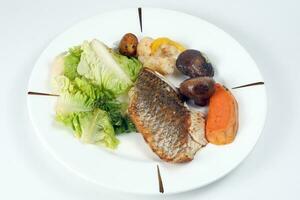 Grilled Seabass vegetable and salad photo