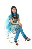 South east Asian Indian race ethnic origin woman wearing Indian dress costume salwar kameez multiracial community on white background photo