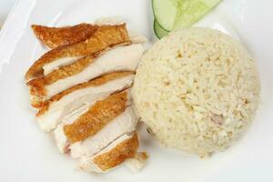 South east asian style chicken rice set steamed roasted sliced chicken with soup dark chilli sauce malaysia china photo