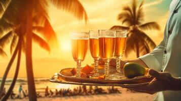 Waiter serving champagne on a tray. Summer beach sunset holiday vacation at beach with palm trees, photo