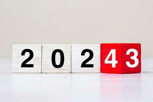 block 2023 to 2024 text on table. Resolution, strategy, plan, goal, motivation, reboot, business and New Year holiday concepts photo