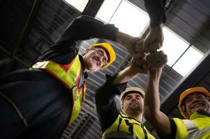 Engineers and technicians must join forces when they want to accomplish big tasks. Uniting together to help each other make great things happen. photo