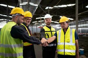 Engineers and technicians must join forces when they want to accomplish big tasks. Uniting together to help each other make great things happen. photo
