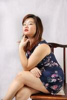 Young attractive southeast Asian woman posing facial expression photo