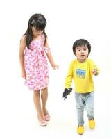 South East Asian young father mother daughter son parent boy girl child activity outdoors park photo