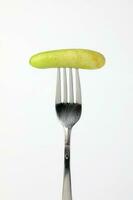 Small mini fresh green cucumber photo