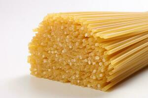 dry raw spaghetti laid on white background macro closeup photo