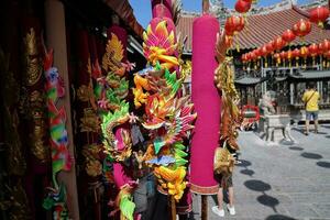 Georgetown, Penang, Malaysia-February 03, 2022- Colourful decorated prayer large joss sticks at Goddess of Mercy Temple. photo