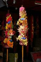 Georgetown, Penang, Malaysia-February 03, 2022- Colourful decorated prayer large joss sticks at Goddess of Mercy Temple. photo