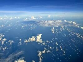 Sky Cloud through aircraft window photo