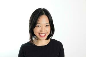 Young attractive south east asian woman pose face expression emotion on white background smile happy photo