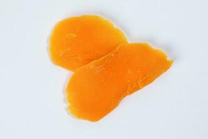 Dry preserved mango ripe fruit slice colorful sweet photo