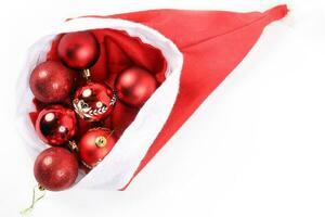 Christmas Hat Red Ornament Decoration on white background photo