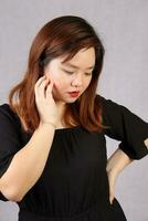 Young attractive southeast Asian woman posing facial expression photo