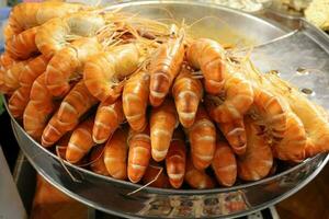 Fresh prawn shrimp BBQ grill at street side food stall photo