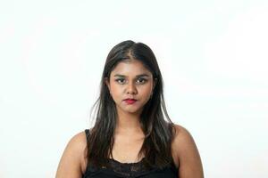 Young attractive Asian Indian woman pose face body expression mode emotion on white background plain look photo