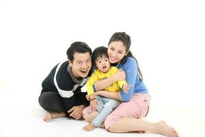 South East Asian young father mother daughter son parent boy girl child activity indoor photo