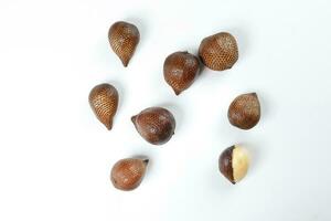 Buah Salak Snake skin fruit on white background photo