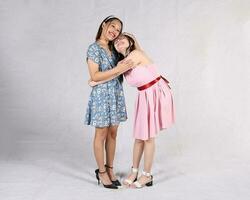 Young aisan woman girl drama acting theatre student performing rehearsal expression pose hug photo