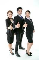 Southeast Asian young office business man woman wearing suit thumbs up on white studio background photo