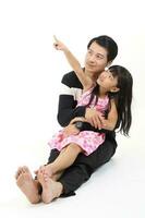 South East Asian young father mother daughter son parent boy girl child activity outdoors park photo