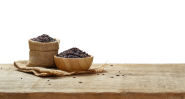 Riceberry in wooden bowl with the chopsticks on the wooden table with transparent background png