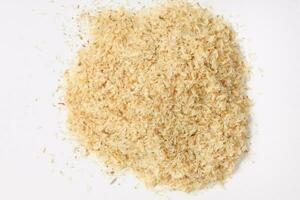 Psyllium Husk Isobgol on white background photo