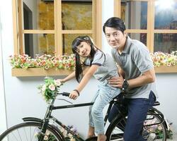 South East Asian young father mother daughter  parent girl child activity photo